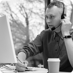 man-working-call-center-with-headphones-computer
